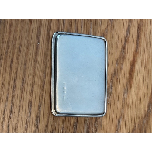 95 - An Edwardian silver side by side twin compartment Patent sliding stamp case, maker's marked rubbed, ... 
