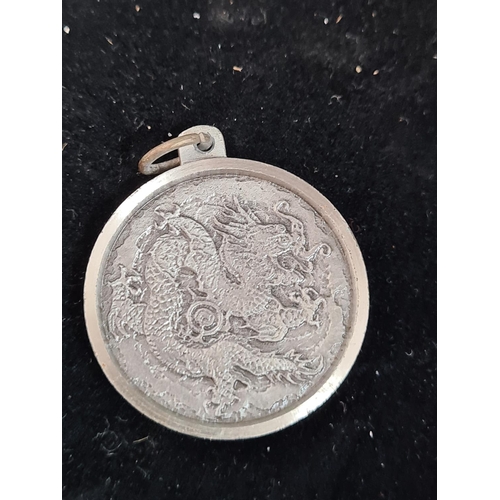 154 - White Metal Chinese Dragon Medallion