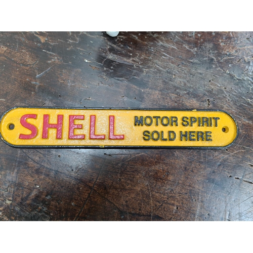 39 - Cast Iron Shell Plaque Sign