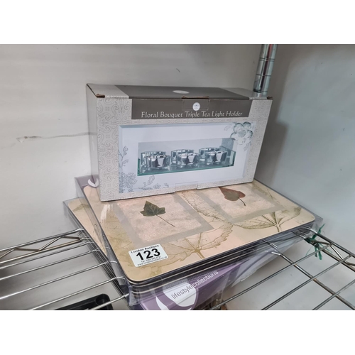 123 - 2 Boxes of New Placemats and a New Tea Light Holder Set