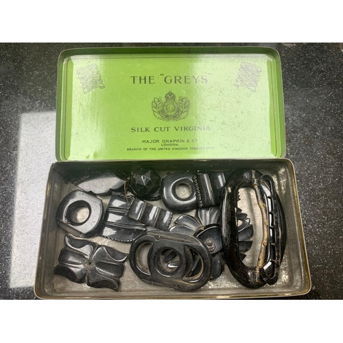 18 - Tin of Assorted Jet Items