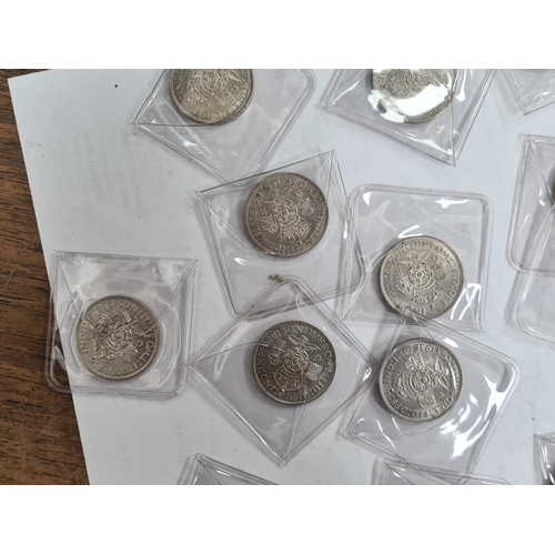 106 - Collection of 21 1938 2 Shilling Coins