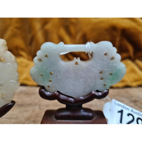 129 - Pair of Carved Jade Pendants on Wooden Stands