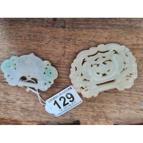 129 - Pair of Carved Jade Pendants on Wooden Stands