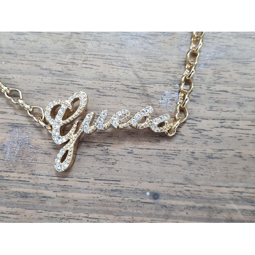 17 - Guess Gold Tone Bracelet