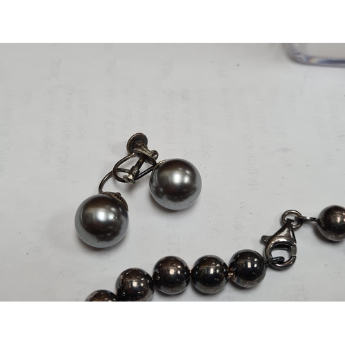 32 - Sterling Silver Ball Bracelet and a Matching Pair of Silver Earrings