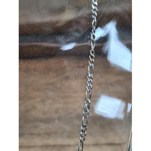 34 - Sterling Silver Figaro Chain