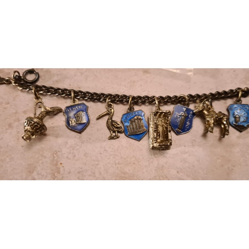 31 - Unusual Vintage Sterling Silver Charm Bracelet including Greek Themed Enameled Charms Weight: 30 g