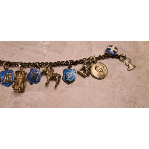 31 - Unusual Vintage Sterling Silver Charm Bracelet including Greek Themed Enameled Charms Weight: 30 g