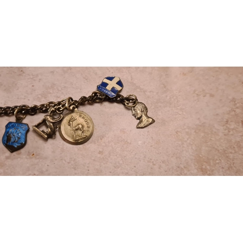 31 - Unusual Vintage Sterling Silver Charm Bracelet including Greek Themed Enameled Charms Weight: 30 g