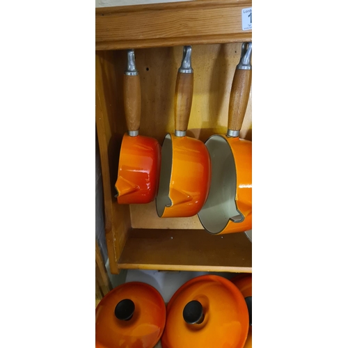 163 - Set of 5 Vintage Cast Iron Orange Le Creuset Pans on Le Creuset Wooden Rack