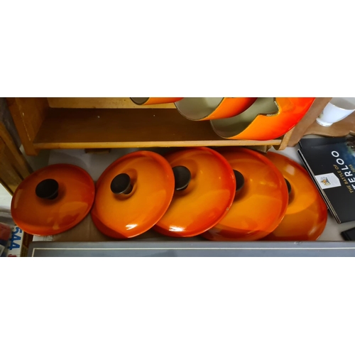 163 - Set of 5 Vintage Cast Iron Orange Le Creuset Pans on Le Creuset Wooden Rack