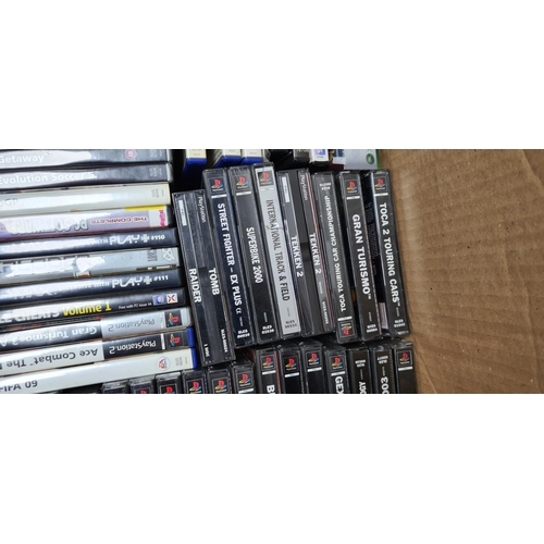 397 - Box Containing a Large Quantity of PS1 / PS2 Games and Controllers