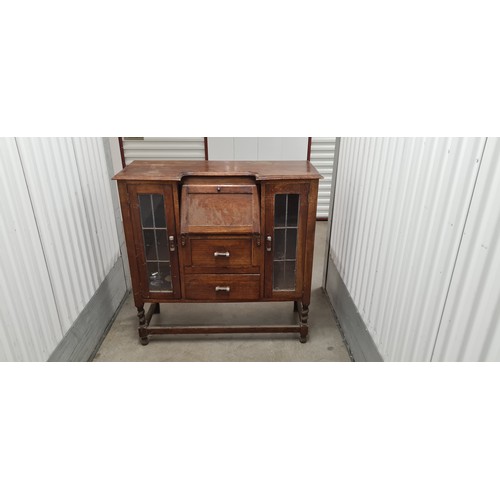 276 - Arts and Crafts Oak Bureau with Central Writing Desk and Glazed Doors either Side