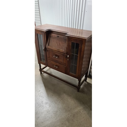 276 - Arts and Crafts Oak Bureau with Central Writing Desk and Glazed Doors either Side