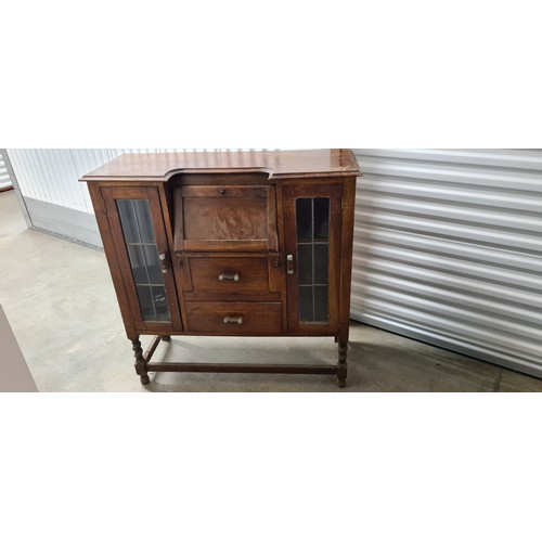 276 - Arts and Crafts Oak Bureau with Central Writing Desk and Glazed Doors either Side