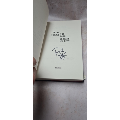 139 - 2 Signed Copies of Frank Turner-Road Beneath my Feet