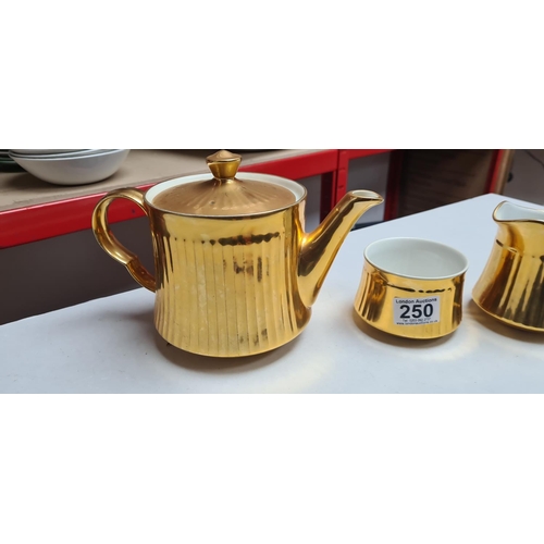 250 - Royal Worcester Gold Lustre Teapot, Milk & Sugar