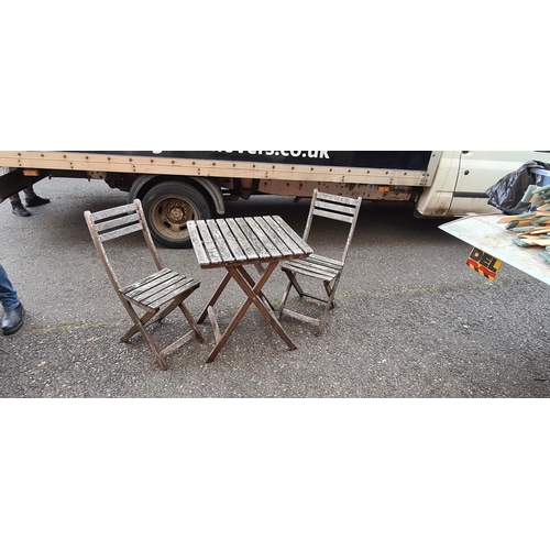 75 - Weathered teak garden table and 2 chairs