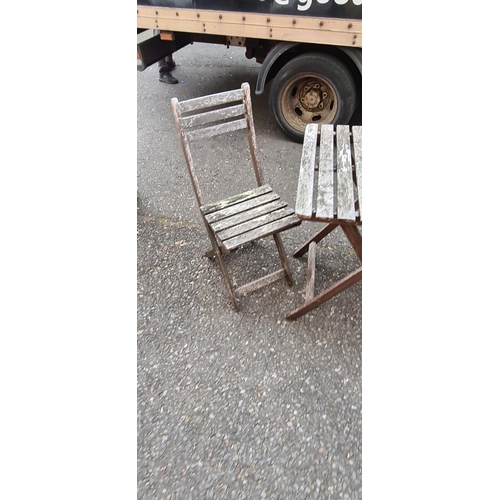 75 - Weathered teak garden table and 2 chairs