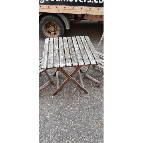 75 - Weathered teak garden table and 2 chairs