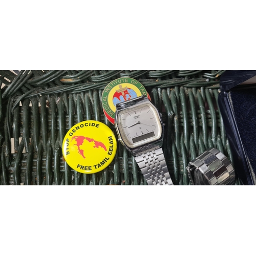 263 - Mixed Lot Containing Old Badges, old £2 coin, silver ring, silver keyring, Citizen Watch Working, a ... 