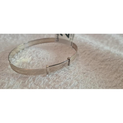 27 - Hallmarked Silver Expanding Bangle