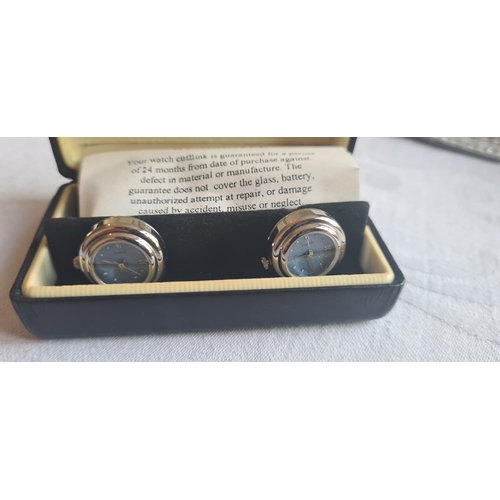 65 - Pair of New and Boxed Watch Cufflinks