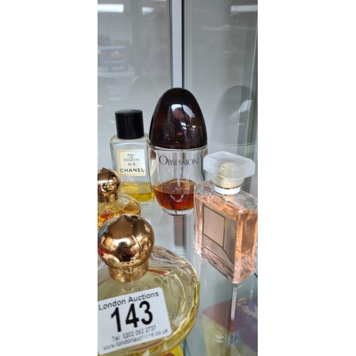 143 - Good Collection of Ladies Perfume to include Chanel, Dior etc