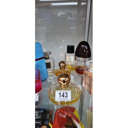 143 - Good Collection of Ladies Perfume to include Chanel, Dior etc