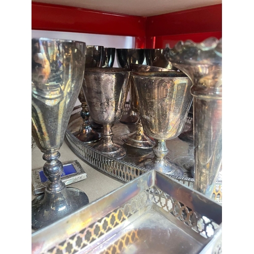 437 - Shelf Containing a Large Quantity of Silver Plate