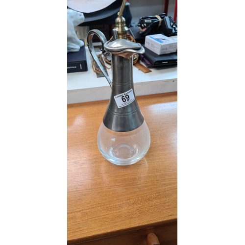 69 - Pewter Claret Jug