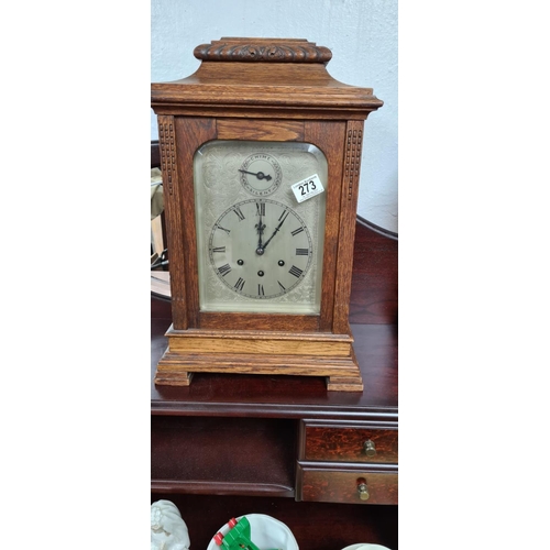 273 - An early 20th Century Gustav Becker Oak Cased Chiming Mantle Clock