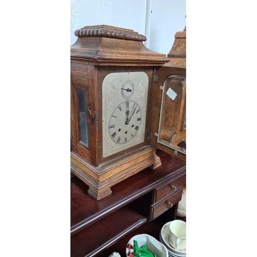 273 - An early 20th Century Gustav Becker Oak Cased Chiming Mantle Clock