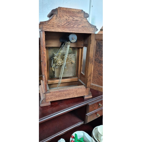 273 - An early 20th Century Gustav Becker Oak Cased Chiming Mantle Clock