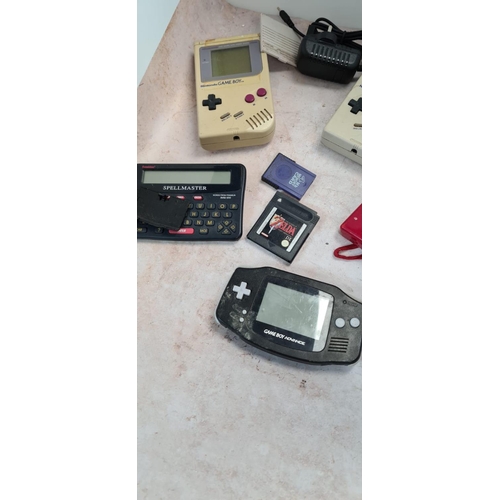 306 - 2 Vintage Gameboys, a Nintendo DS, Gameboy Advance etc