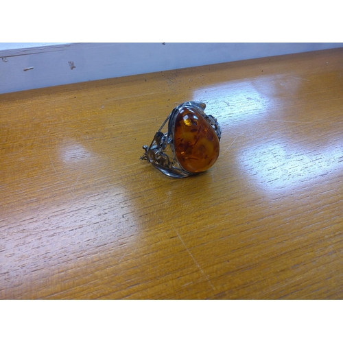 20 - Hallmarked Silver and Amber Bangle 55.2g