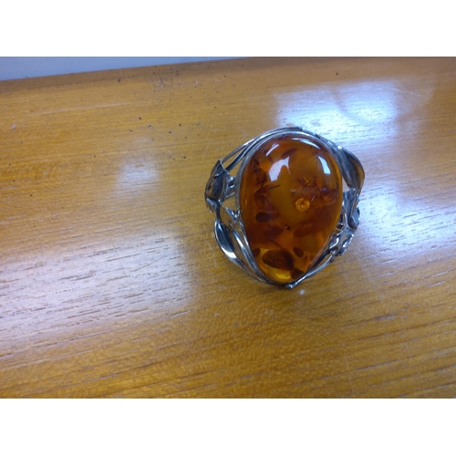 20 - Hallmarked Silver and Amber Bangle 55.2g