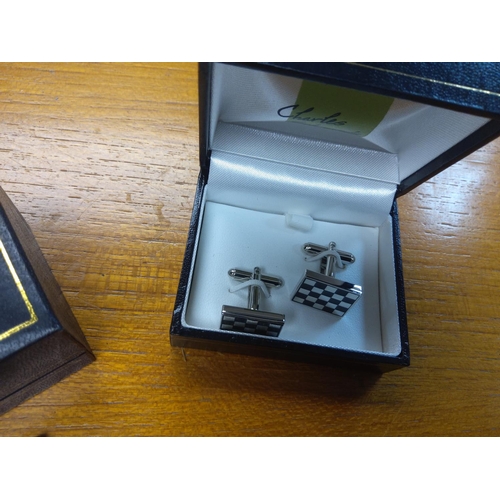 240 - New and Boxed Cufflinks Set and a Tie Tack