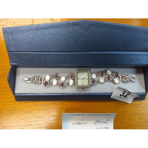 32 - Garnet and Mother of Pearl Silver Watch