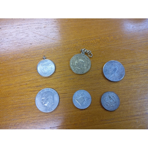 36a - Collection of Coins to include: 1922 Silver Dollar, 1964 Half Dollar in a yellow metal mount, 1962 h... 