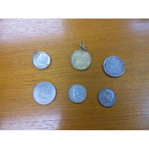 36a - Collection of Coins to include: 1922 Silver Dollar, 1964 Half Dollar in a yellow metal mount, 1962 h... 