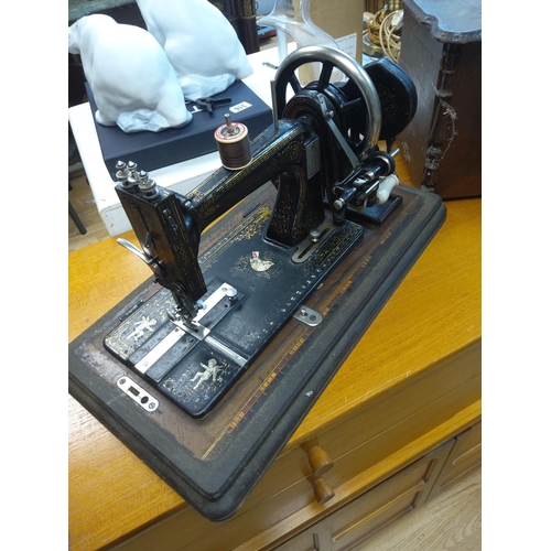 443 - Oak Cased Sewing Machine