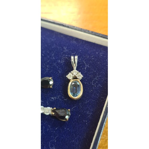 16 - A 9ct White Gold, Yellow Gold Pendant with 1 Sapphire and a Trilogy of Diamonds plus a Pair of 9ct G... 