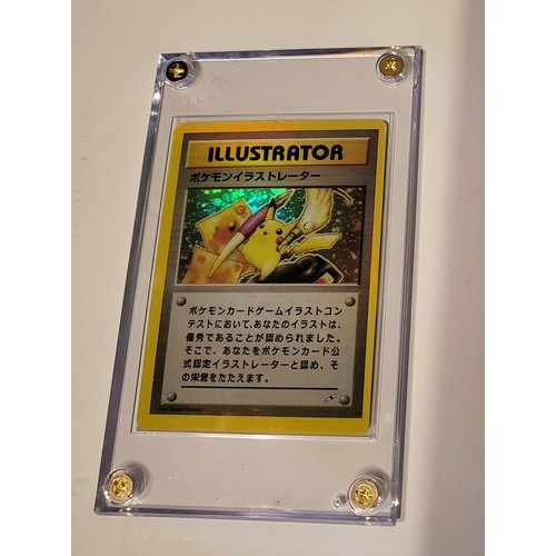 23 - A trading card in plastic slab case