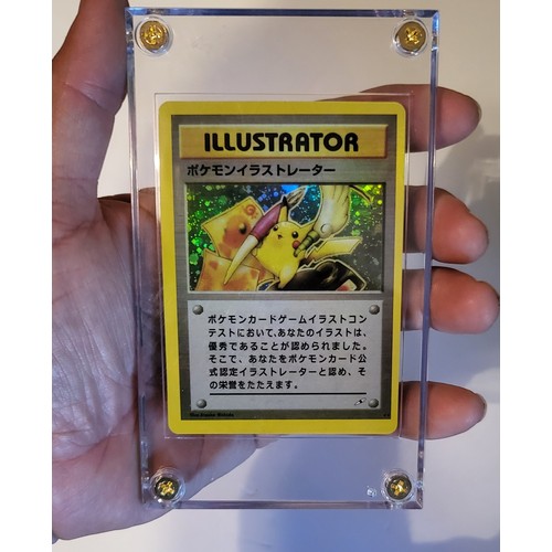 23 - A trading card in plastic slab case