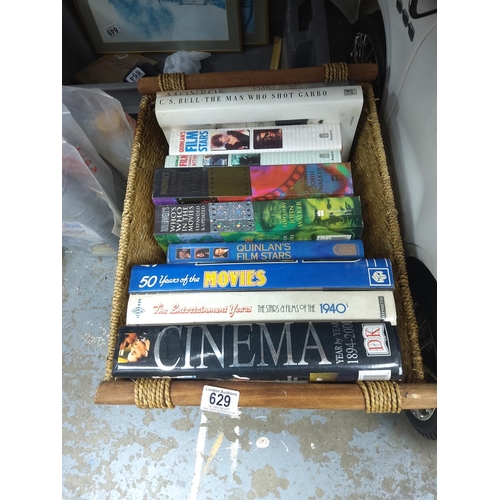 480 - A Wicker Basket containing a good collection of film related books incl Marilyn Monroe