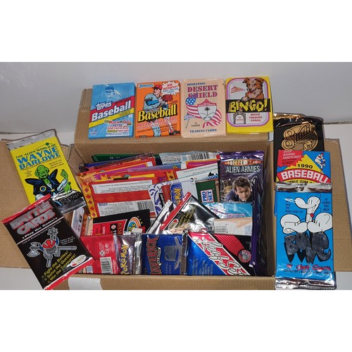 8 - Box containing a selection of unopened packs of trading cards and stickers including Pokemon, Baseba... 