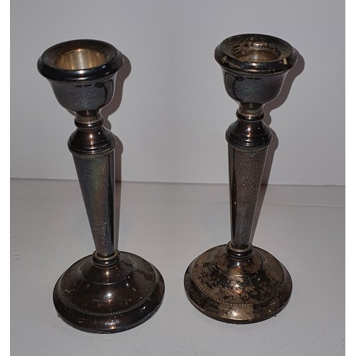 17 - A Pair of hallmarked Silver candle stick holders - Gross weight: 250g