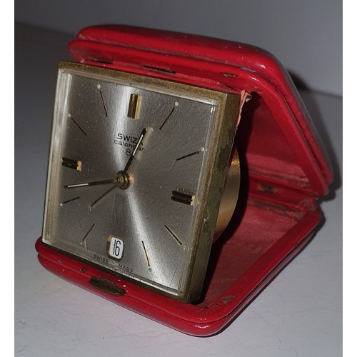 27 - Vintage Swiza travel alarm clock in red case